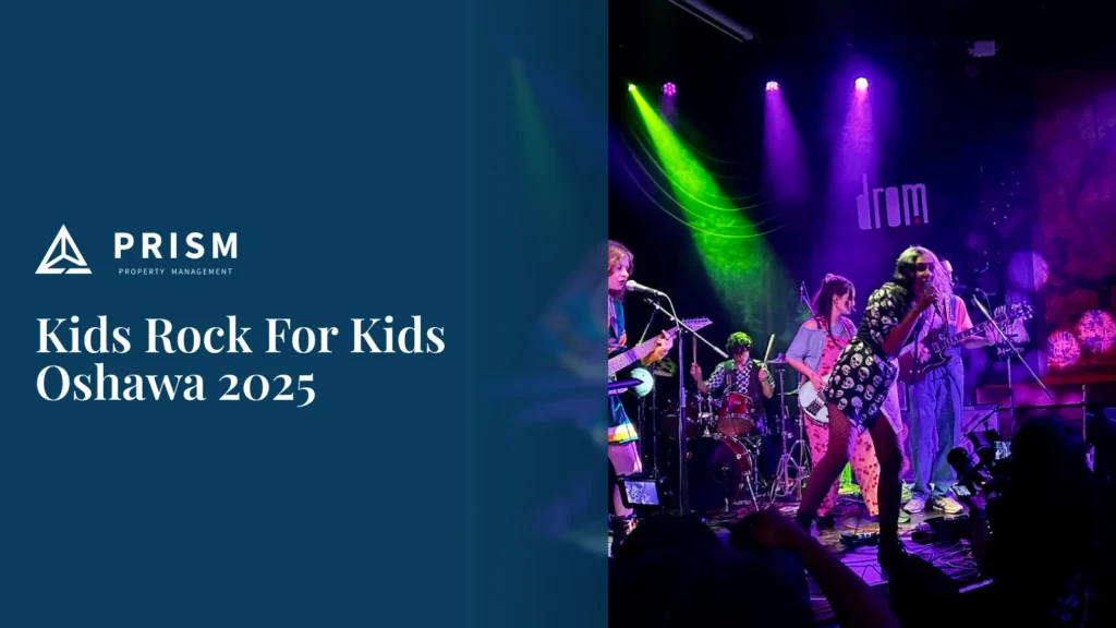 Picture of a band performing on an indoor stage with purple and green lights for an audience. On a dark blue background, the white text "Kids Rock For Kids Oshawa 2025" is displayed below the "PRISM PROPERTY MANAGEMENT" logo.