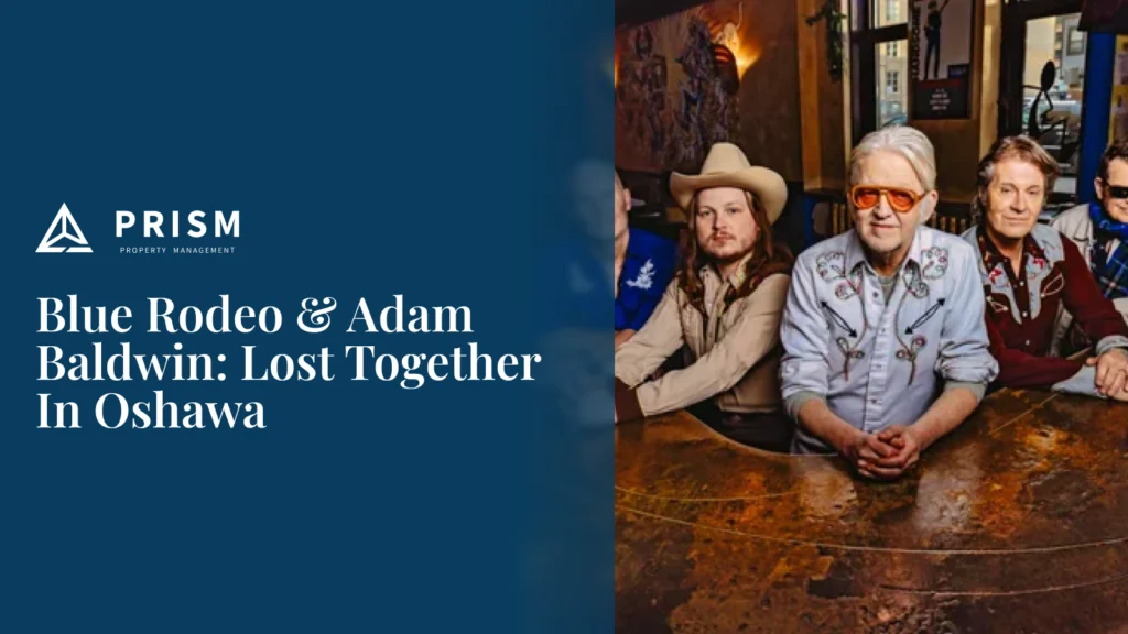 Promotional banner for the Blue Rodeo and Adam Baldwin concert in Oshawa, featuring musicians seated at a bar beside the event title.